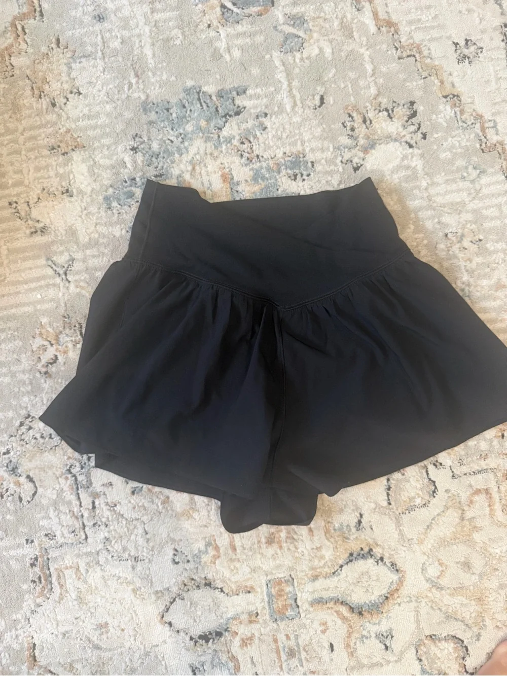 Women's Black High-Waist Athletic Shorts with Flared Hem